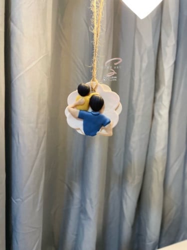 تعليقة سياره اب وطفل