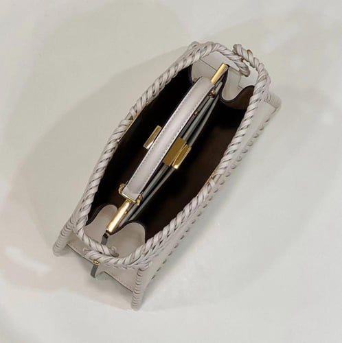 Peekaboo Camellia leather bag with matching thread...