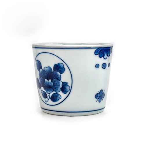 كوب فخاري برسمة زهور زرقاء إبداعية