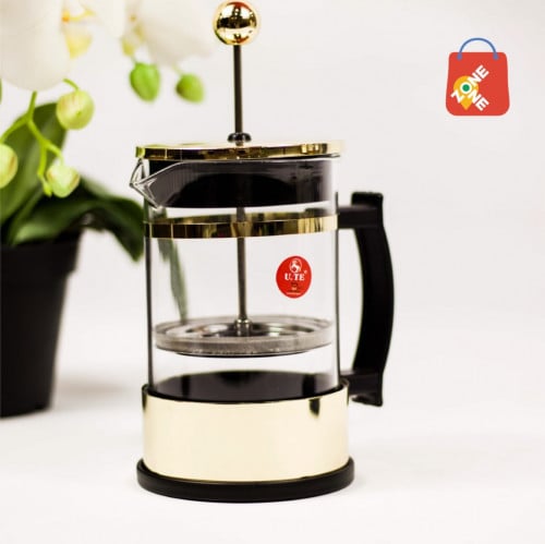 إبريق زجاج بمصفاة يدوية عامودية