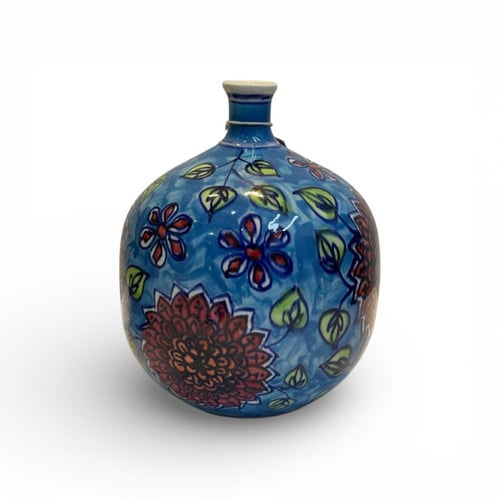 علبة زهرة حمراء