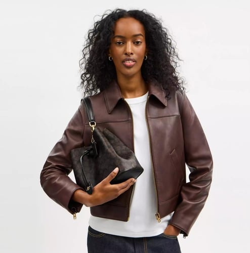 Rowan Bucket Bag In Signature Canvas