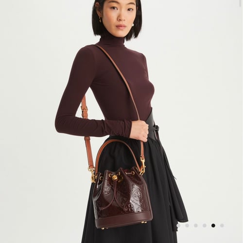 T MONOGRAM PATENT EMBOSSED BUCKET BAG