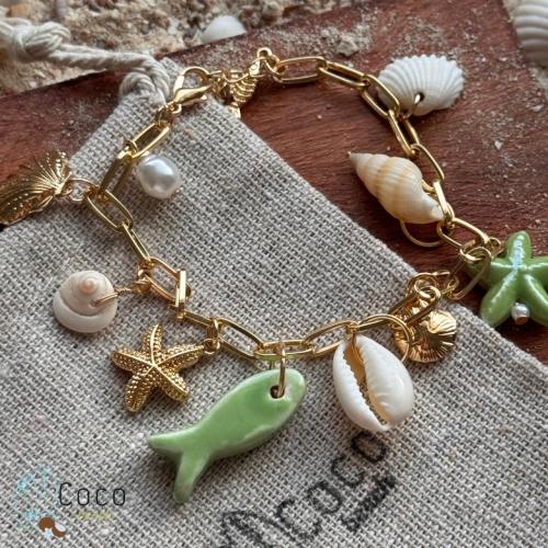 اسوارة اصداف وسمكة