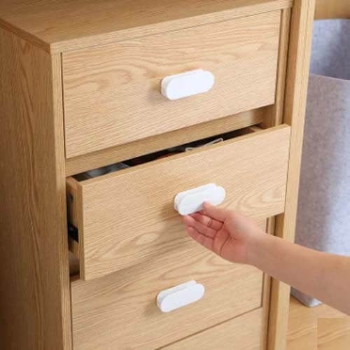 مقابض دواليب وادراج لاصقة شكل بيضاوي لون رصاصي أني...