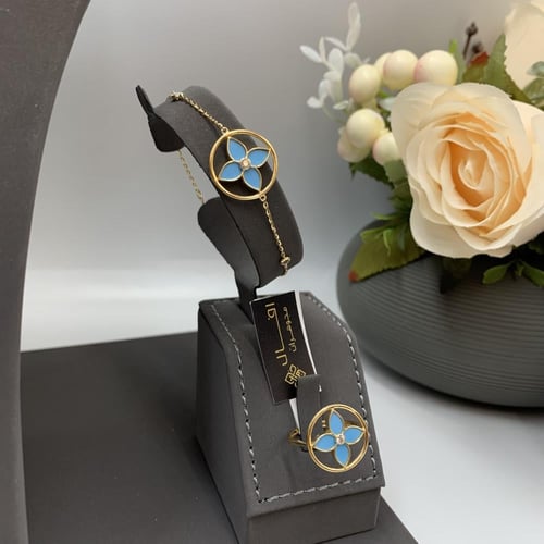 طقم إيطالي باللون الفيروزي عيار 18 الوزن 11.1