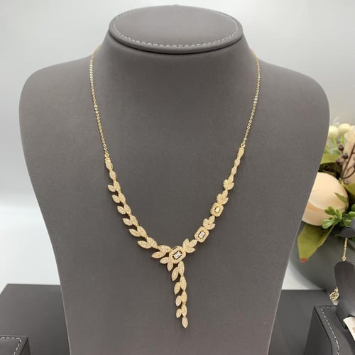 طقم شبكه تصميم الألماس لازردي عيار 18 الوزن 18.1