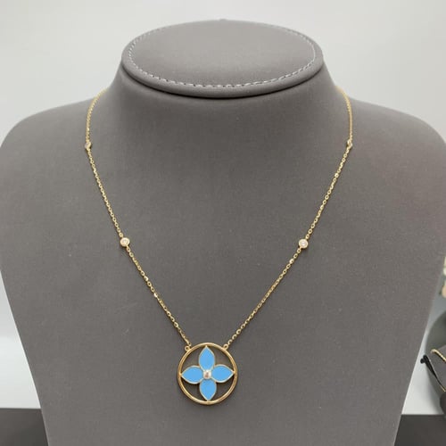 طقم إيطالي باللون الفيروزي عيار 18 الوزن 11.1