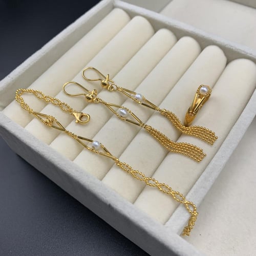 طقم بحريني بإضافة اللؤلو الزراعي عيار 21 الوزن 26