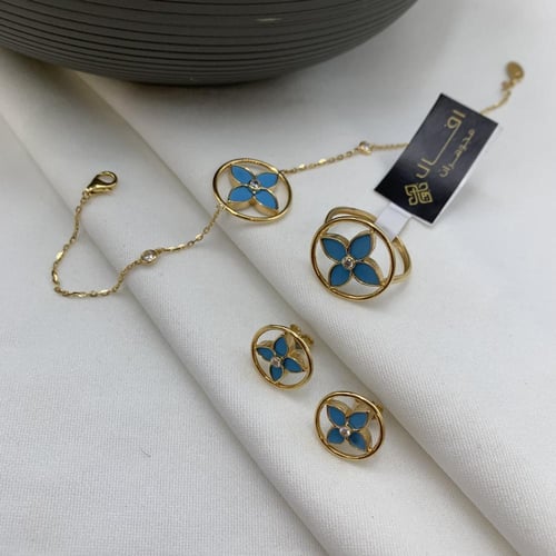 طقم إيطالي باللون الفيروزي عيار 18 الوزن 11.1