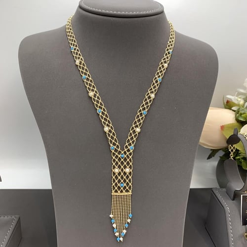 طقم إيطالي بإضافة اللؤلو الزراعي عيار 18 الوزن 24....