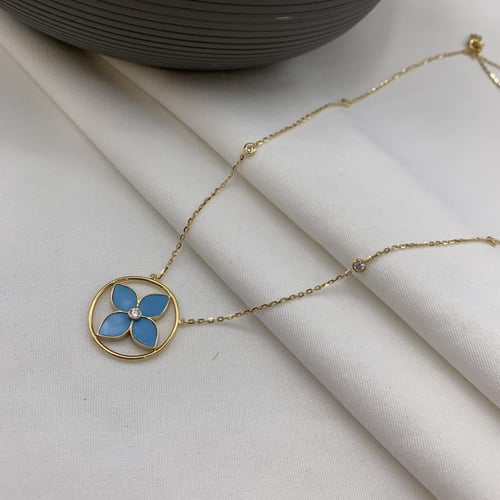 طقم إيطالي باللون الفيروزي عيار 18 الوزن 11.1