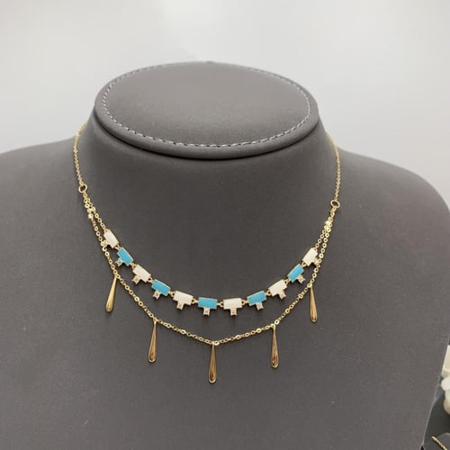 طقم إيطالي باللون الأبيض والفيروزي عيار 18 الوزن 8...