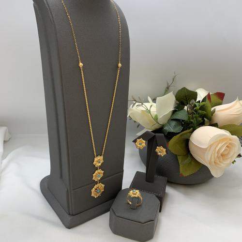 نص طقم بحريني عيار 21 باللون الفيروزي الوزن 10.4