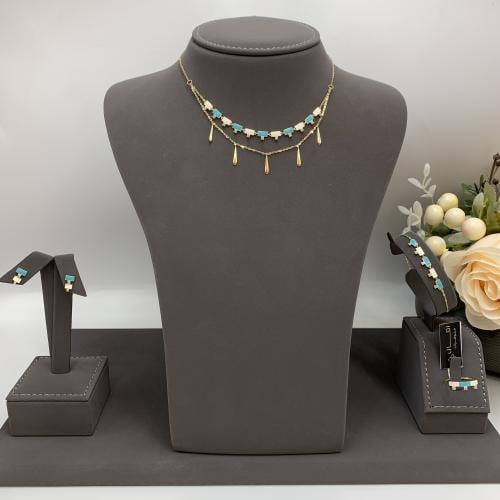 طقم إيطالي باللون الأبيض والفيروزي عيار 18 الوزن 8...