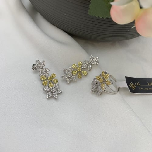 نص طقم تصميم الألماس عيار 18 الوزن 11.7