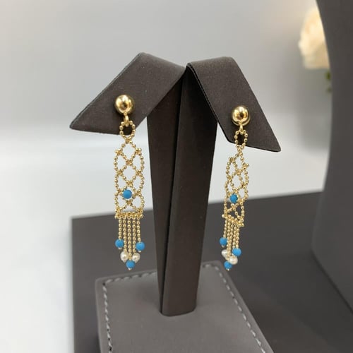 طقم إيطالي بإضافة اللؤلو الزراعي عيار 18 الوزن 24....