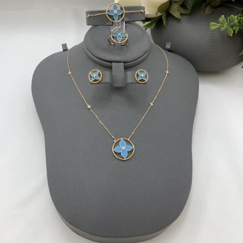 طقم إيطالي باللون الفيروزي عيار 18 الوزن 11.1