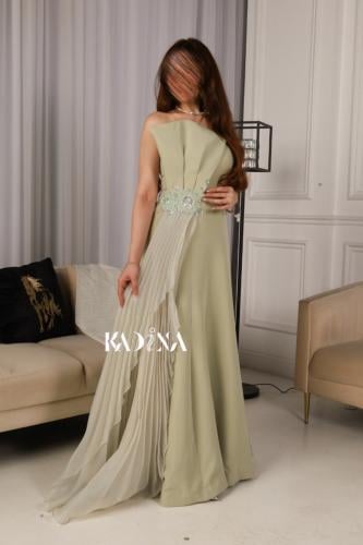 فستان سهرة طويل زيتي فاتح بتصميم حديث فخم