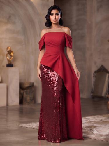 فستان سهرة أحمر فاخر بتصميم "أوف شولدر" وتنورة ترتر براقة