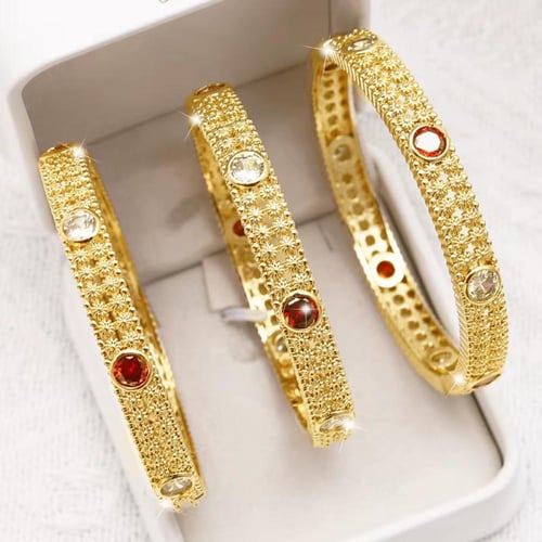 أساور دبـي نحاس مطلية ذهب 24ق