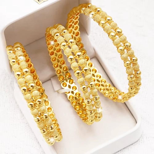 أسورة دبـي مطلية ذهب 24ق