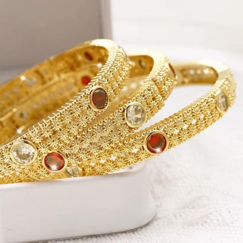 أساور دبـي نحاس مطلية ذهب 24ق