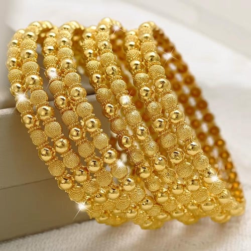 أسورة دبـي مطلية ذهب 24ق