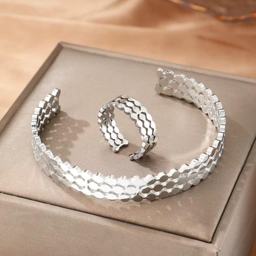 أساور وخواتم ستانلس ستيل مطلية ذهب 18ق