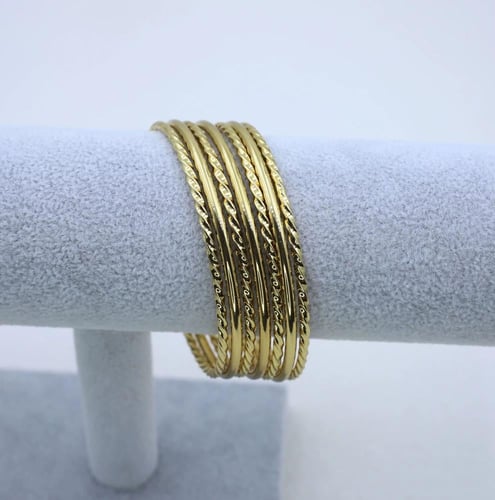 طقم 7 أساور نحاس مطلية ذهب