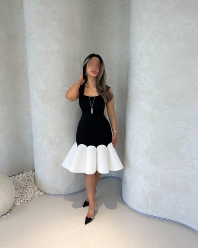 فستان سن محير اسود