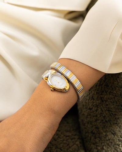 ساعة فاخرة بتصميم أنثوي راقٍ مكس ميناء أبيض