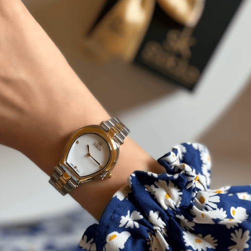 ساعة نسائية استيل ناعم باللون الذهبي و الفضي ميناء...