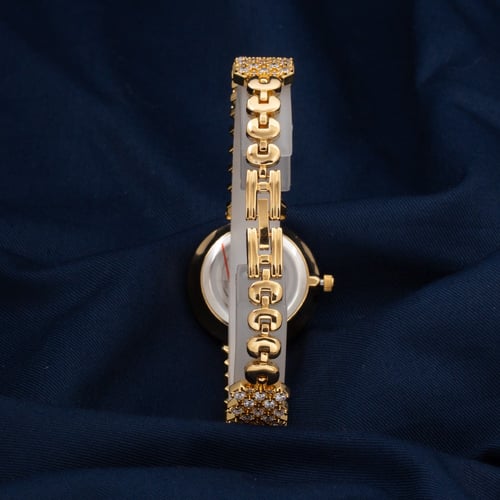 ساعة مرصعه بفصوص زركون ذهبي ميناء ابيض