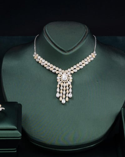 طقم نسائي زركون تصميم متكامل باللون الفضي والذهبي