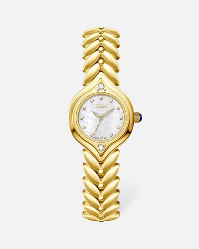 ساعة بتصميم مبتكر باللون الذهبي الأبيض