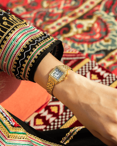 ساعه استيل براقة ذهبي