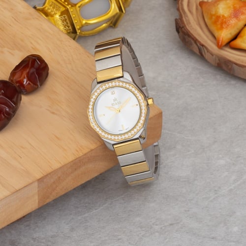 ساعة نسائية باللون الذهبي والفضي ميناء ابيض