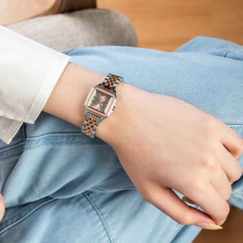 ساعة نسائية استيل واطار فصوص زركون باللون النحاسي...