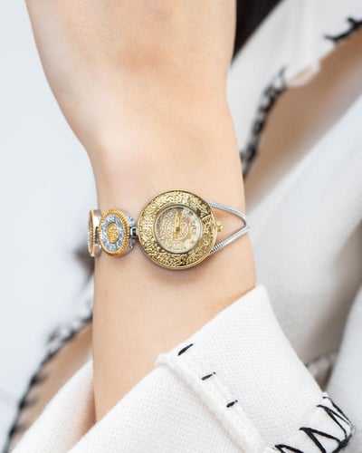 ساعة الجنيهات باللون المكس ميناء ذهبي