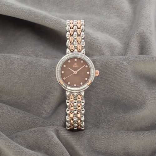 ساعة نسائية باللونين الفضي والنحاسي