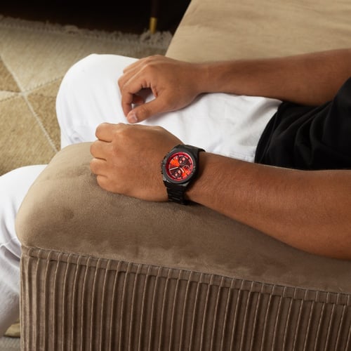 ساعة رجالية استيل باللون الاسود ميناء احمر