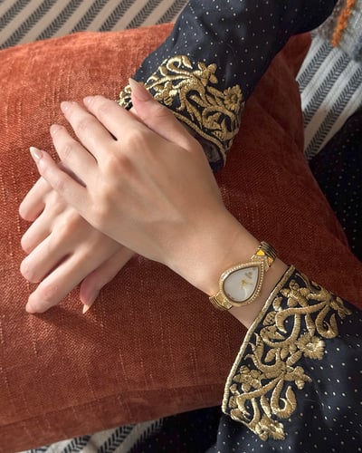 ساعه استيل متفردة ذهبي