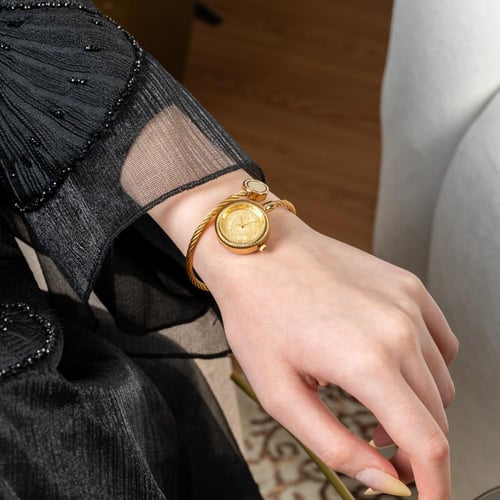 ساعة نسائية حصير باللون الذهبي ميناء ذهبي...