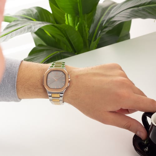 ساعة رجالية باللونين الفضي والنحاسي