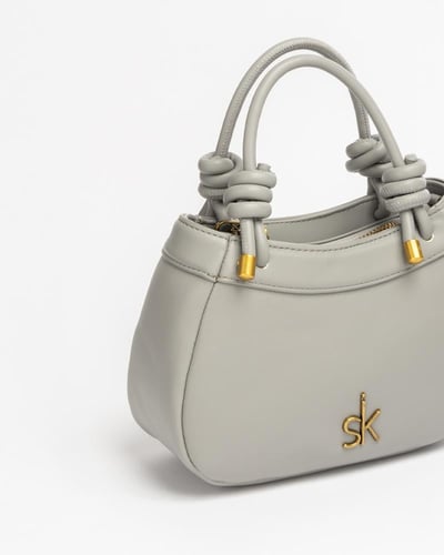 شنطة لون رصاصي حجم صغير