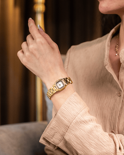 ساعــة اسـتـيل مـيـني ذهبيه