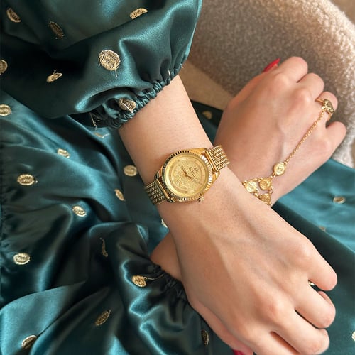 ساعة نسائية بسير حصير ملفت باللون الذهبي ميناء ذهب...