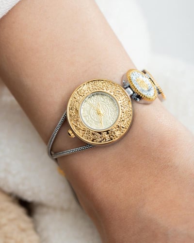 ساعة الجنيهات باللون المكس ميناء ذهبي