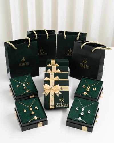 بكج اطقم 4 اطفال قطع ( علبة + كيس )